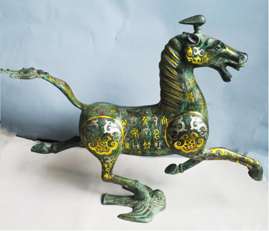 三星堆僚人虞朝吐似马踏龙雀